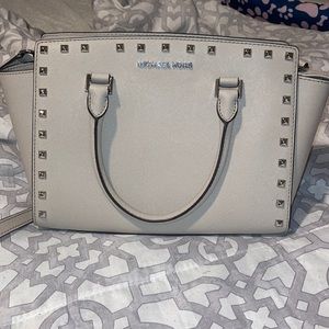 Authentic Greyson- taupe colored mk studded bag